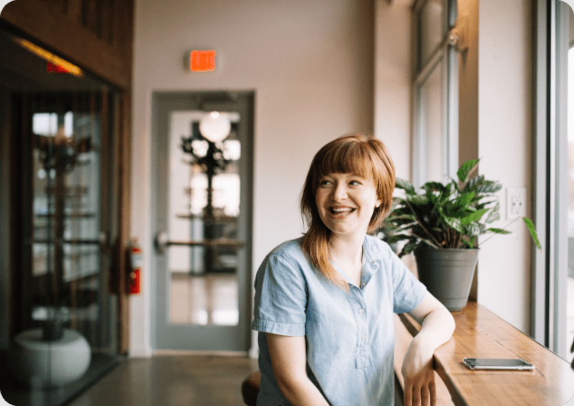 Smiling woman in office